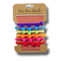 Set de 6 bandas elásticas PartyStore con pompones de colores para identificar bebidas en fiestas