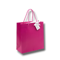 Bolsa de regalo PartyStore color bugambilia con asas trenzadas y etiqueta decorativa blanca, 26x19x12 cm.