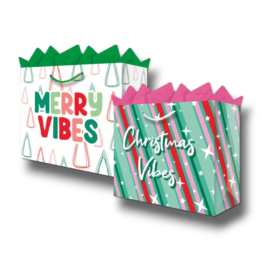 Dos bolsas de regalo PartyStore con diseños navideños coloridos, motivos de árboles y estrellas, y texto festivo.