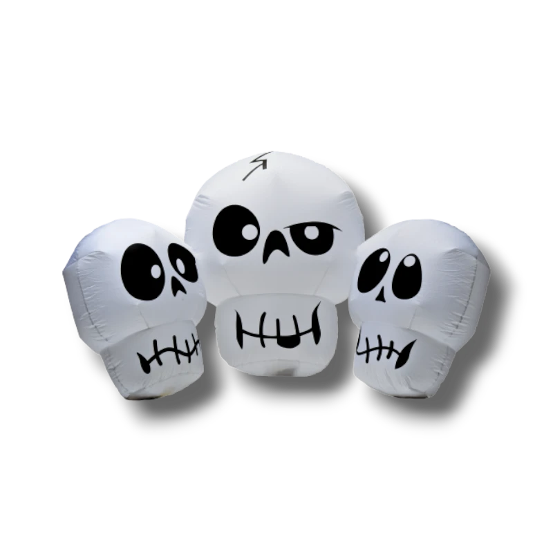 Tres calaveras inflables blancas con expresiones divertidas de PartyStore para decoración de Halloween