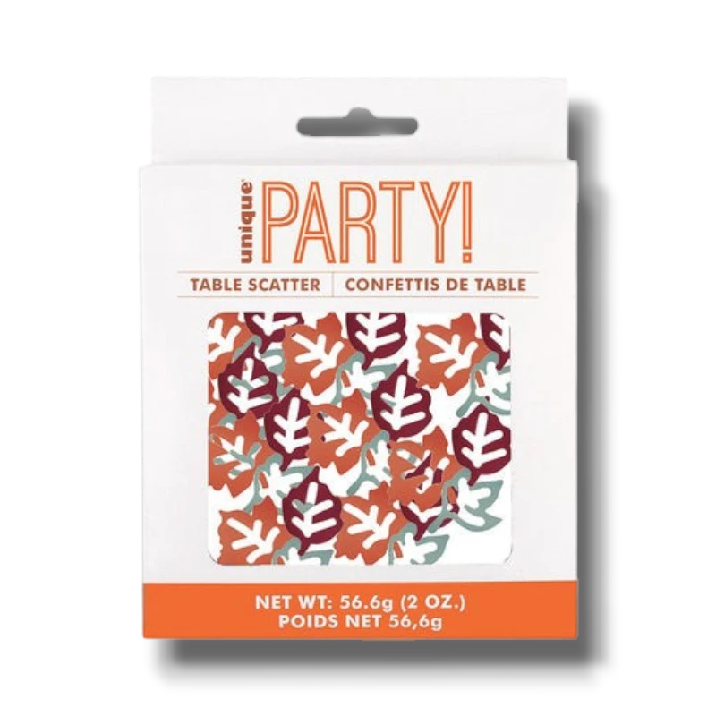 Confeti de hojas de otoño PartyStore en tonos naranja, granate y crema para decoración de mesas festivas