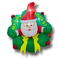 Corona navideña inflable PartyStore de 1.5 metros con Santa Claus y letrero Happy Holidays en colores rojo y verde