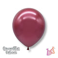Globo PartyStore de 9 pulgadas en color rosa cromo con acabado brillante y metálico para decoración de fiestas