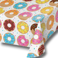 Mantel de mesa PartyStore con estampado colorido de donas glaseadas y chispas de colores sobre fondo blanco