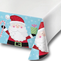 Mantel de mesa PartyStore con diseño navideño de Santa Claus, bastones de caramelo y copos de nieve sobre fondo azul