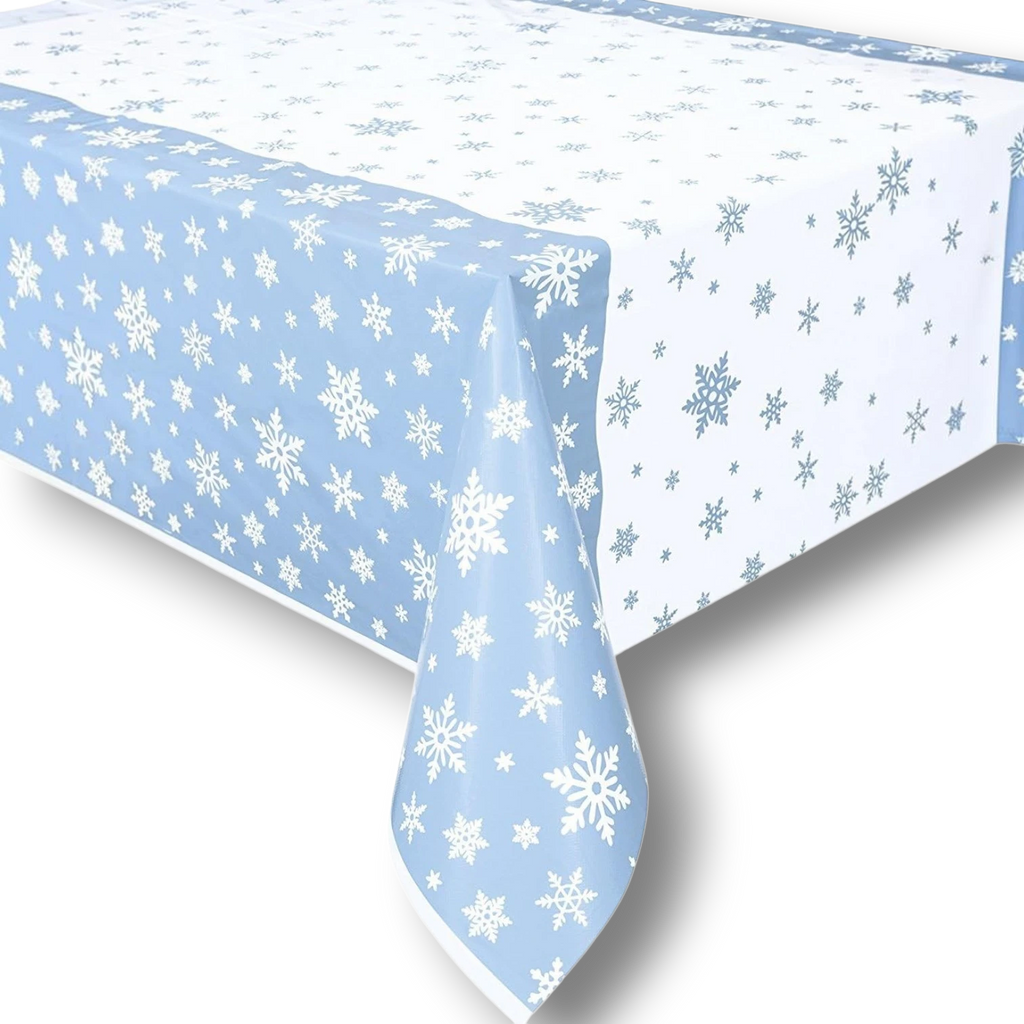 Mantel rectangular PartyStore con estampado de copos de nieve blancos sobre fondo azul claro para decoración navideña