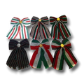 Set de seis moños patrios PartyStore con diseños de rayas tricolores y detalles dorados para celebraciones mexicanas