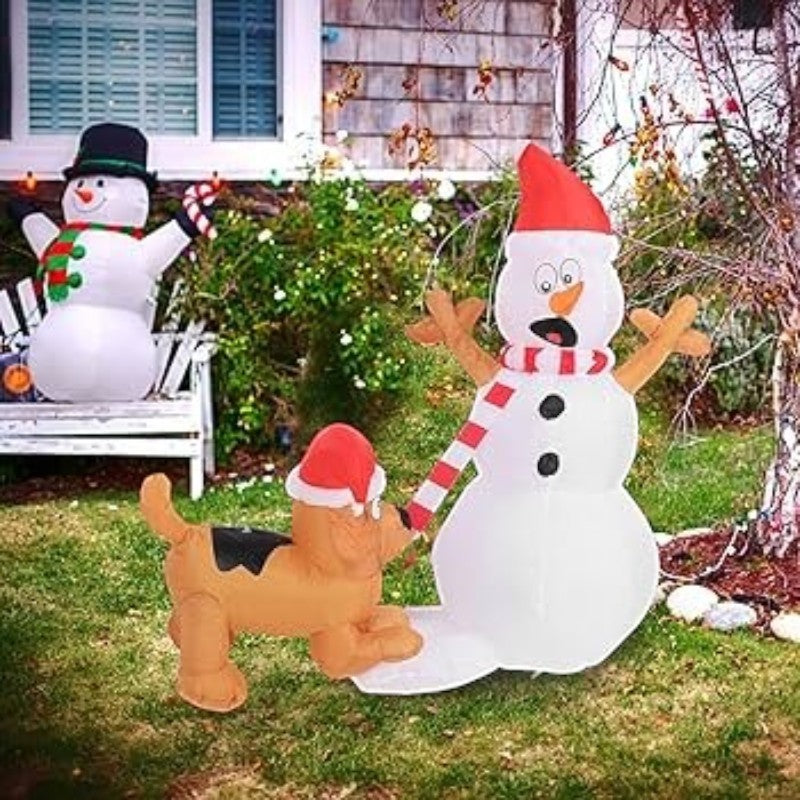 Decoración navideña inflable PartyStore de 1.5 m con un muñeco de nieve y un perrito jugando en el jardín