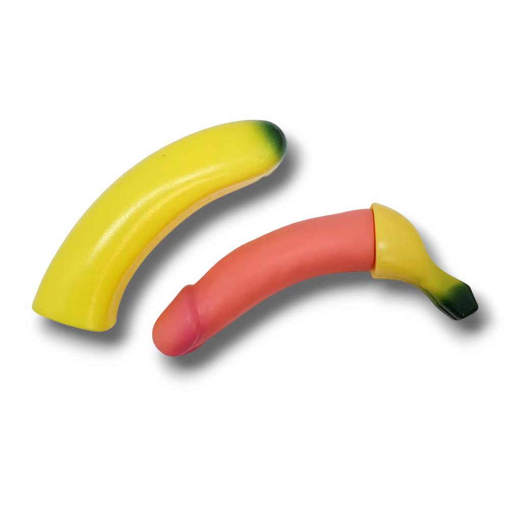 Plátano de juguete PartyStore de plástico en colores amarillo y rosa para decoración de fiestas