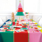 Platos de papel PartyStore con diseño navideño colorido y figuras festivas para mesa de fiesta