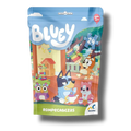 Rompecabezas Bluey de 24 piezas en empaque de PartyStore con personajes de la serie en un jardín